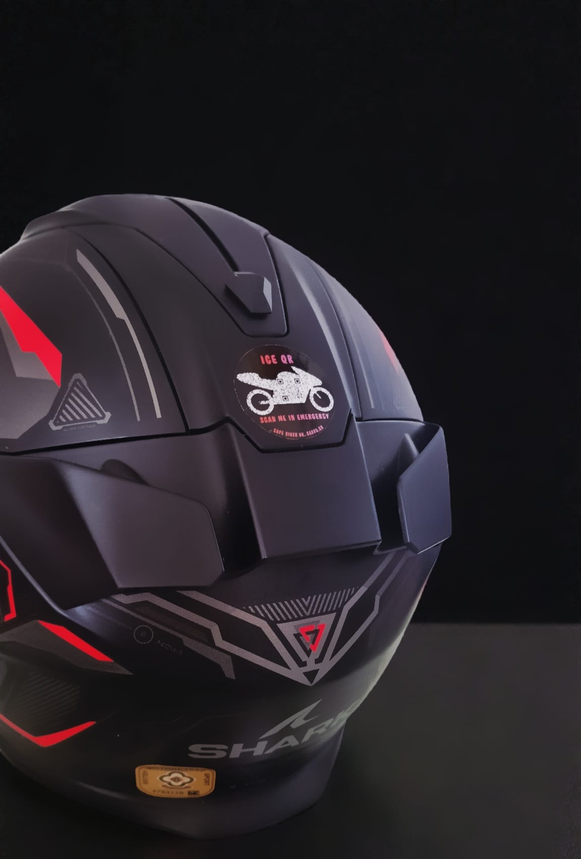 ICE QR code in the shape of a motorcycle.